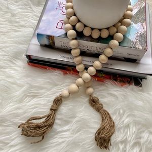 Natural wood bead garland with twine tassels